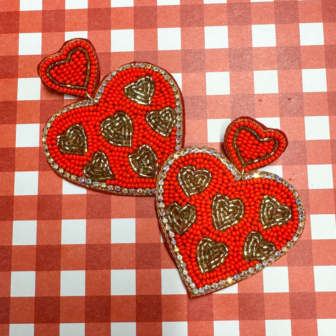 valentine's day beaded earrings with a delicate red heart adorned with small gold hearts