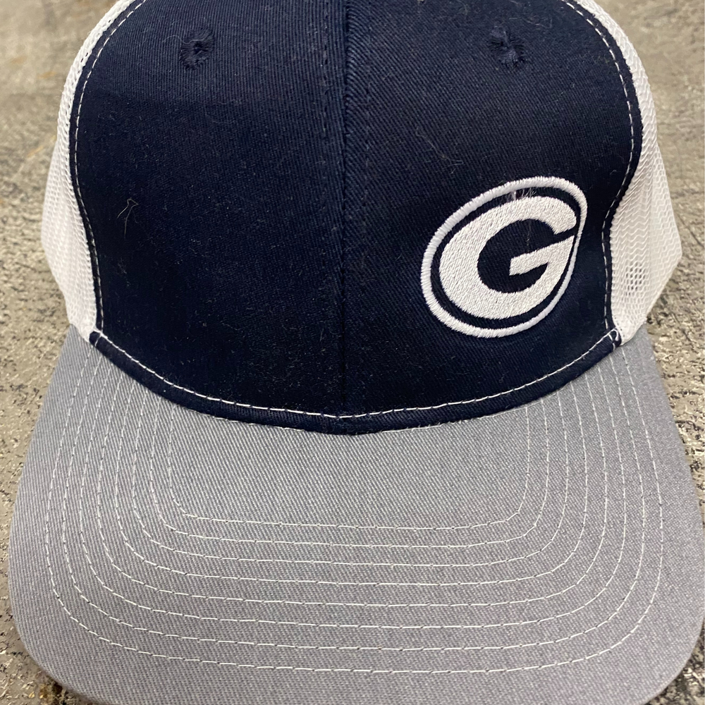greenwood bulldog embroidered snapback hat. One hat has a navy front panel, white flesh, grey bill with a white embroidered greenwood g.