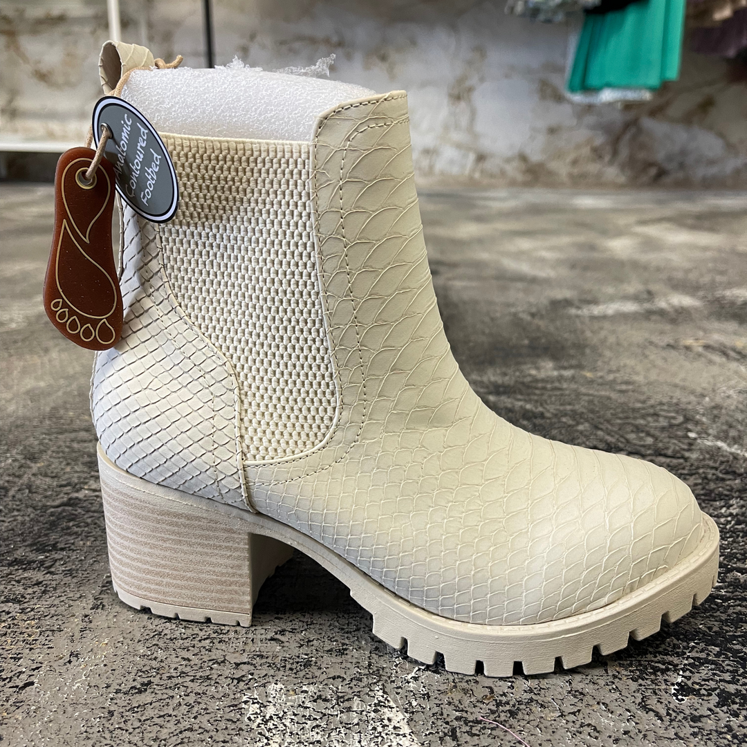Sunday's Best Ivory Booties, mia brand, wedge ivory bootie with rubber sole and textured snack type print. 