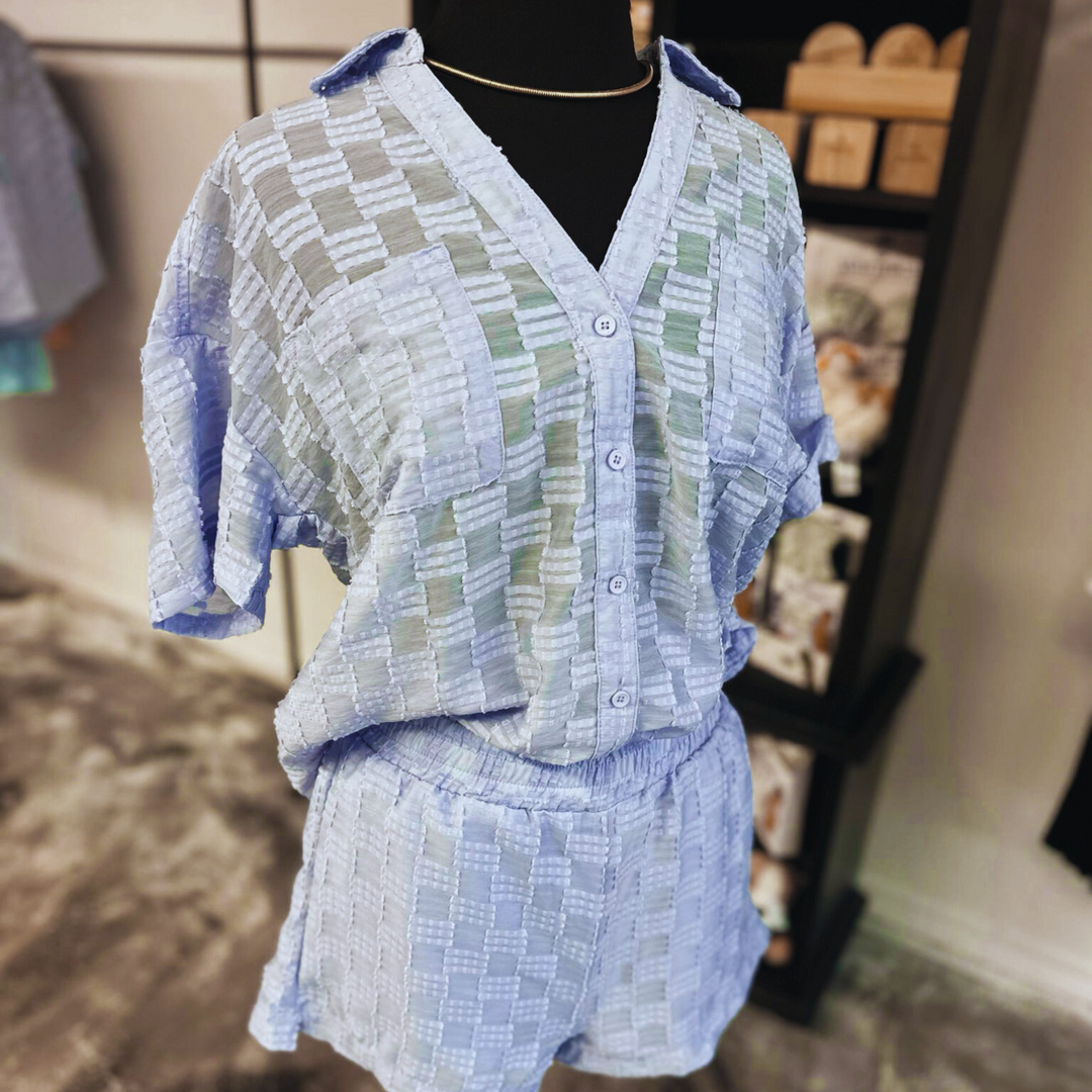 Lavender blue checkered set, light weight set, shorts and short sleeve button up top. two pockets on bust area.