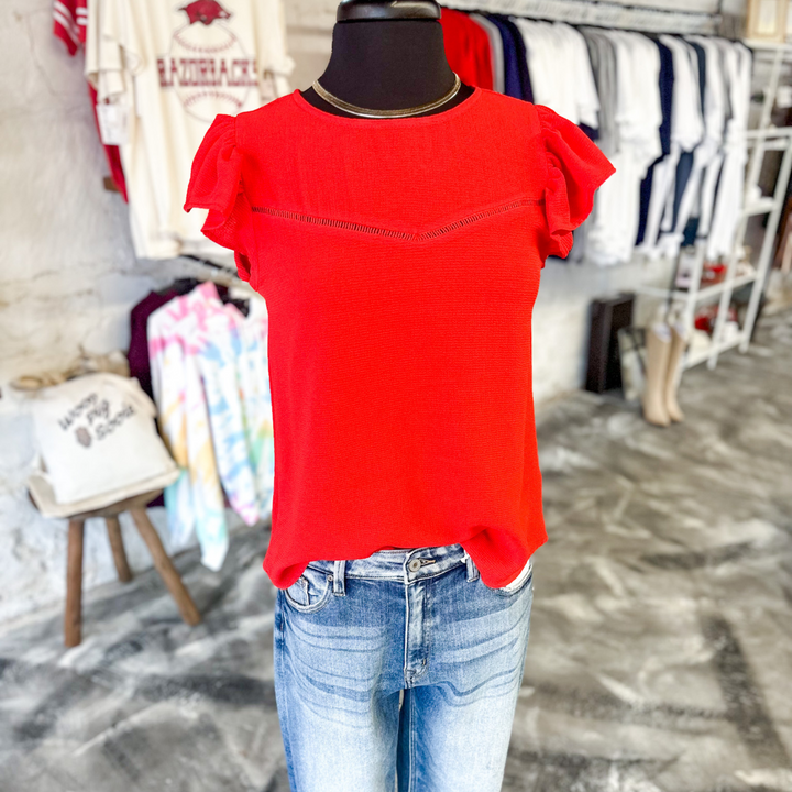 Red pepper causal Top, pairs well with jean shorts or jeans for the cooler spring days, women's top, small detail close to neckline with fabric, ruffle sleeve
