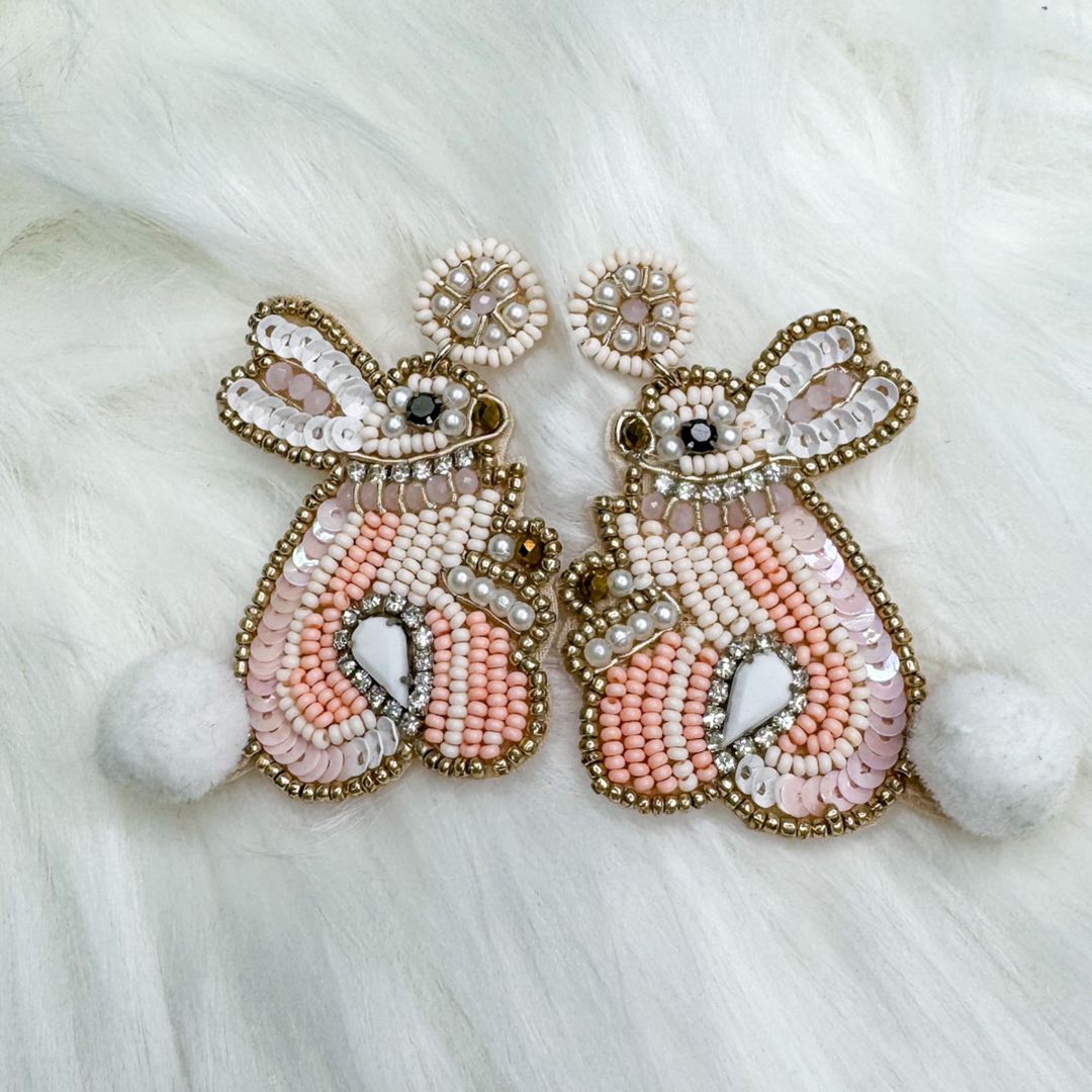 easter beaded earrings, pink bunny made out of beads, sequence, rhinestone, with a furry ball tail, felt backing, post style earring. 
