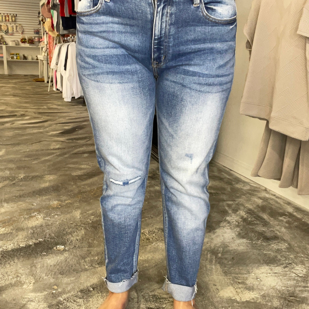 The Bolt High Rise Skinny Denim Jean, Kancan jeans, mix of a dark and light wash with distressing on the knees, able to cuff or uncuff. 