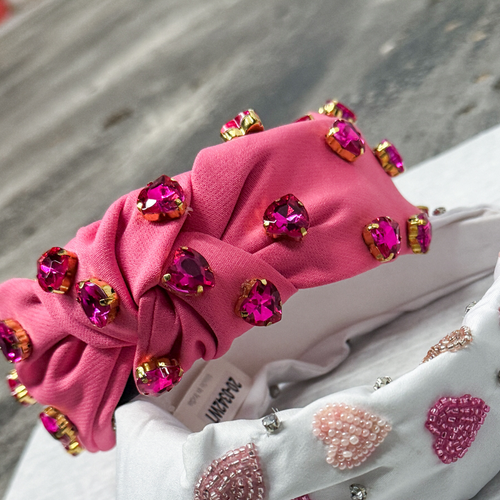 pink head band with hot pink jeweled hearts and a touch of gold