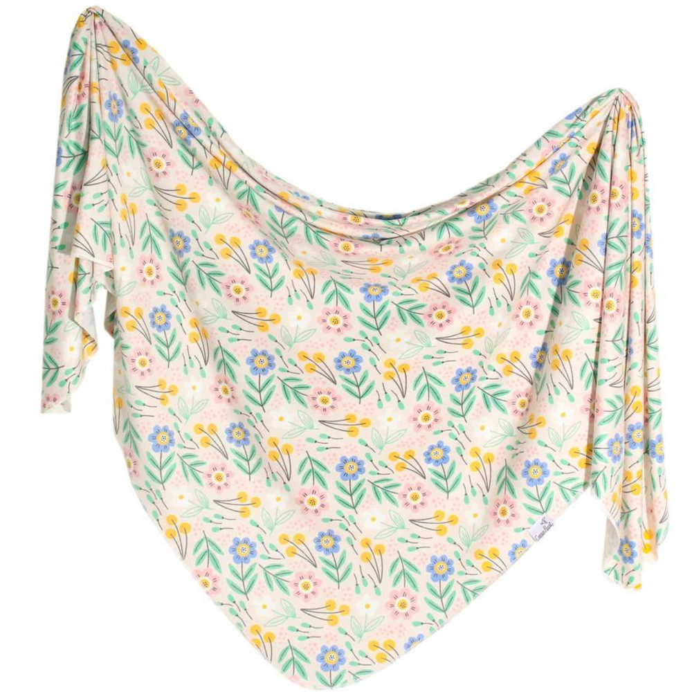 the perfect amount of girlie touch wrapped up in one swaddle. with the pink, purple and yellow flowers it is perfect. 