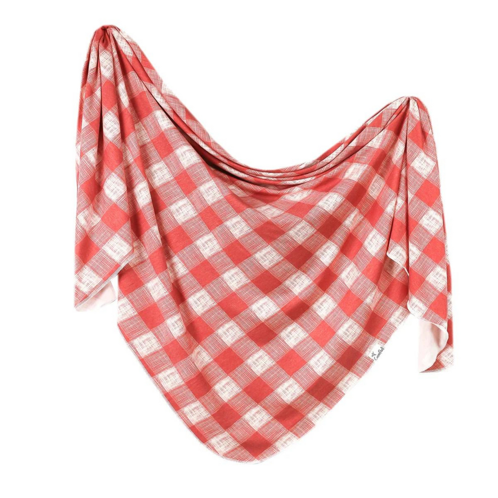 copper pearl ralph swaddle blanket. red and white large gingham print with heatherd lines. 