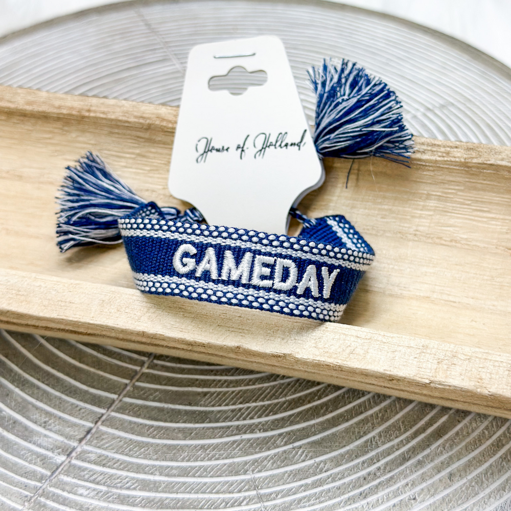 embroidered tassel bracelet, navy and white, says "gameday"
