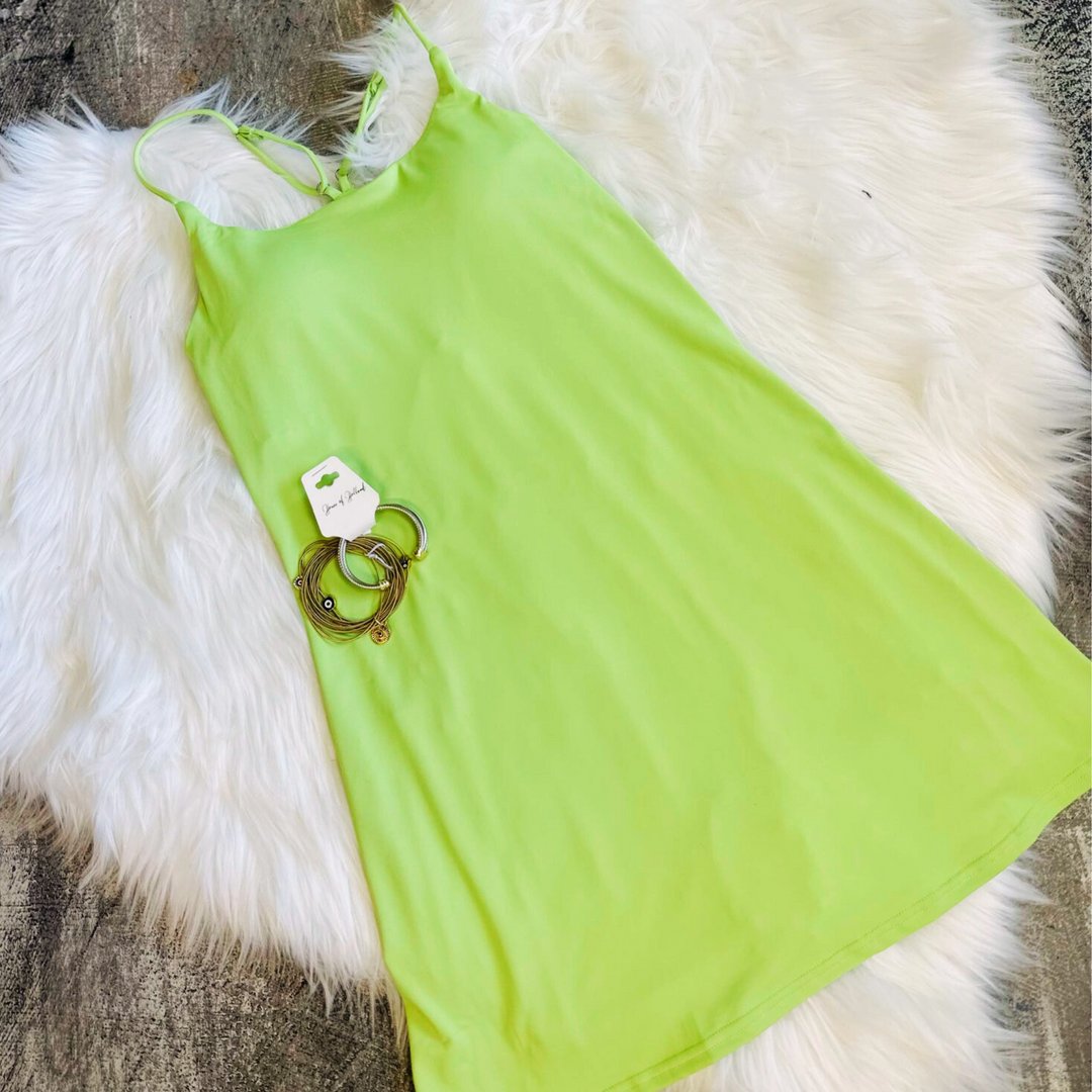 Fit Queen active Dress in vibrant lime and mauve.