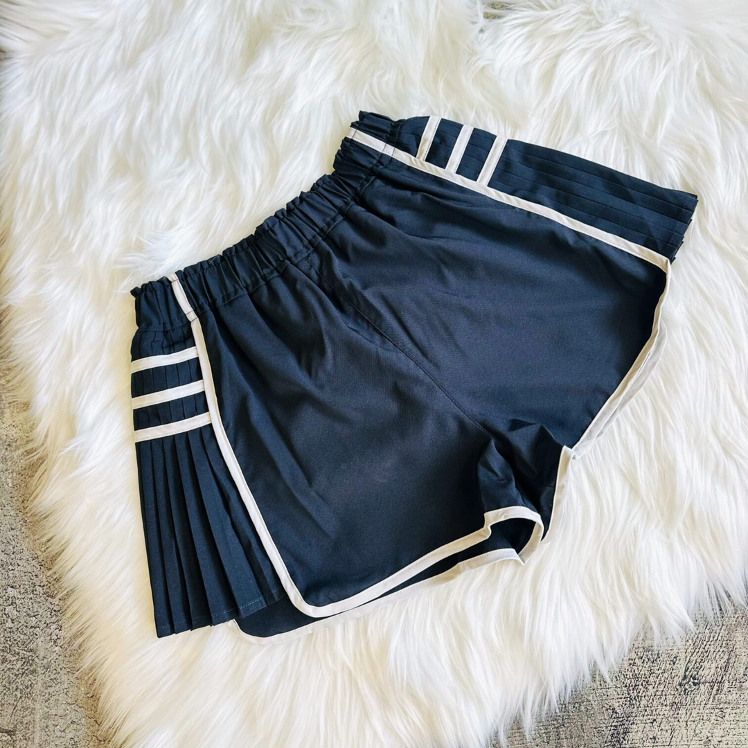 Running After You Black Shorts, These dressy and chic active shorts feature a sleek black design with white trim details with lining.