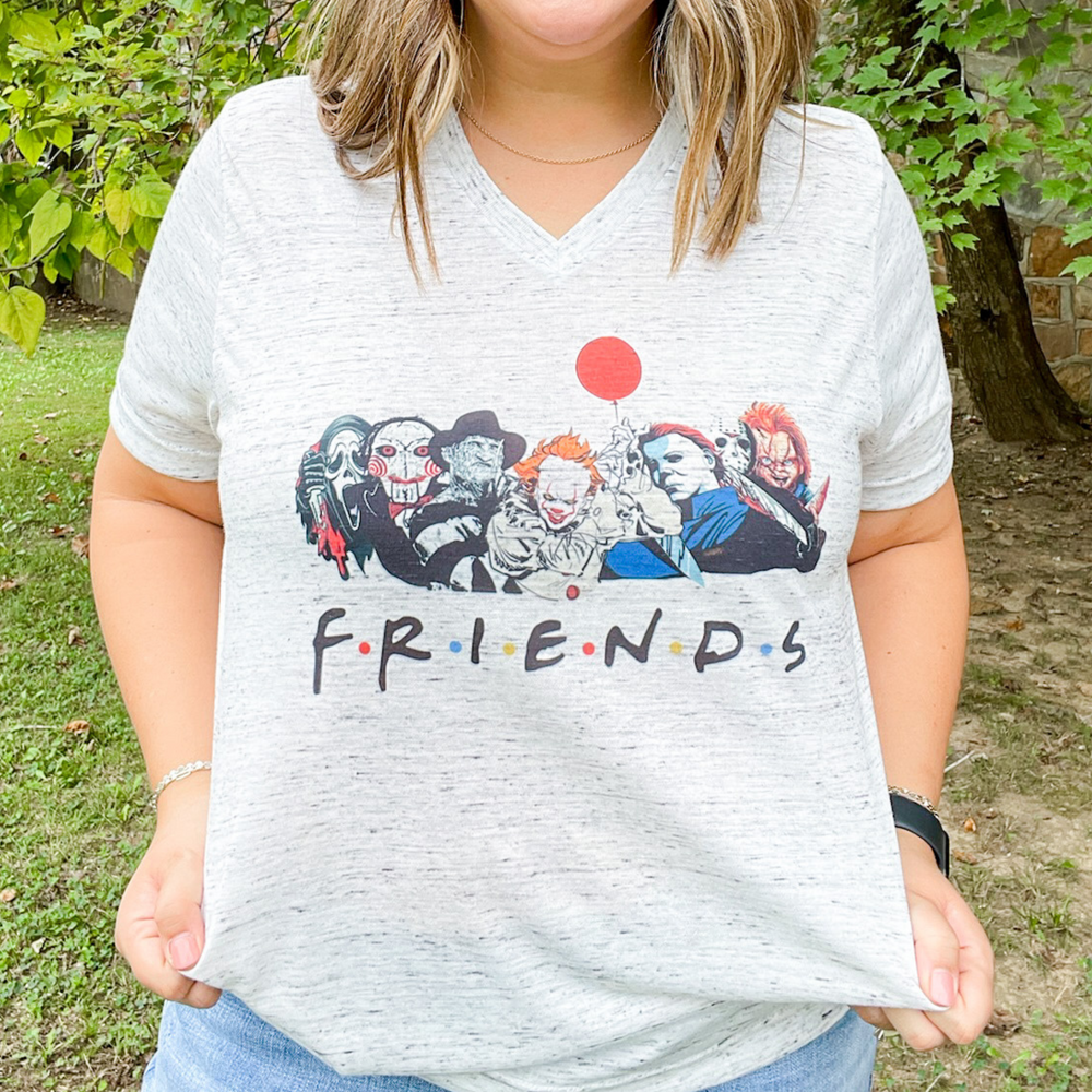 friends halloween graphic tee, heathered grey with a slight v-neck, halloween bad guy characters with the word friends under neath in the show friends font.