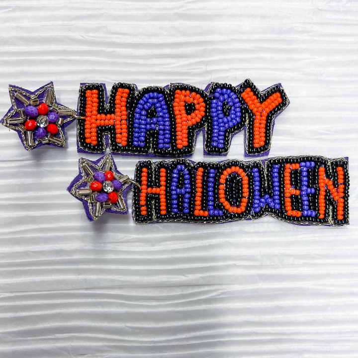 halloween beaded earrings, happy halloween in orange and purple and black. 