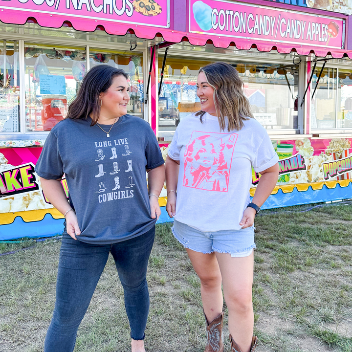 black and white graphic tee that says long live cowgirls with different cowboy boots. dolly parton graphic tee in pink on a white shirt