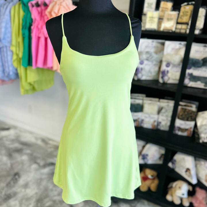 Fit Queen active Dress in vibrant lime and mauve.