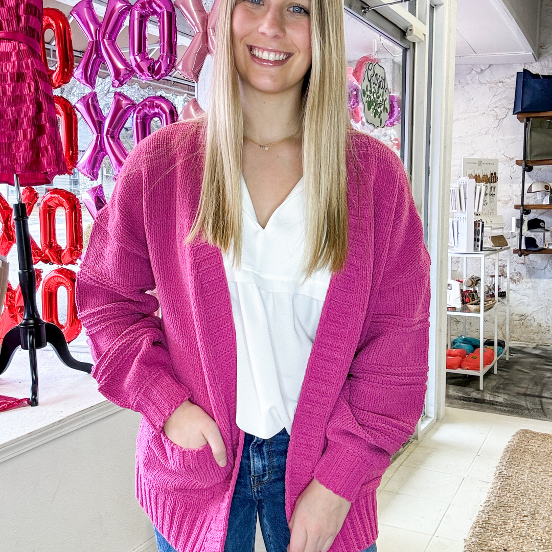 hot pink cardigan, women's cardigan, super soft, outline details on the trip of the hem and sleeve, pockets.