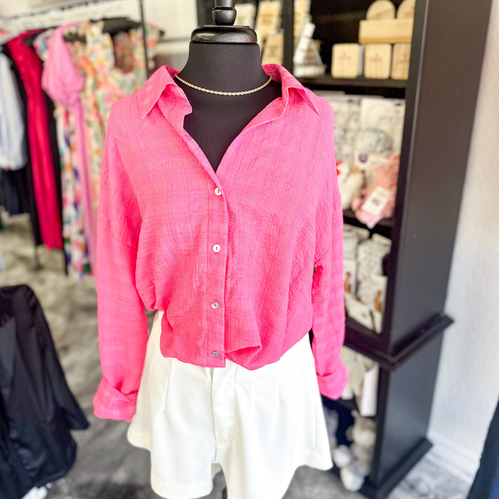 hot pink textured button up shirt with permanent twist tie