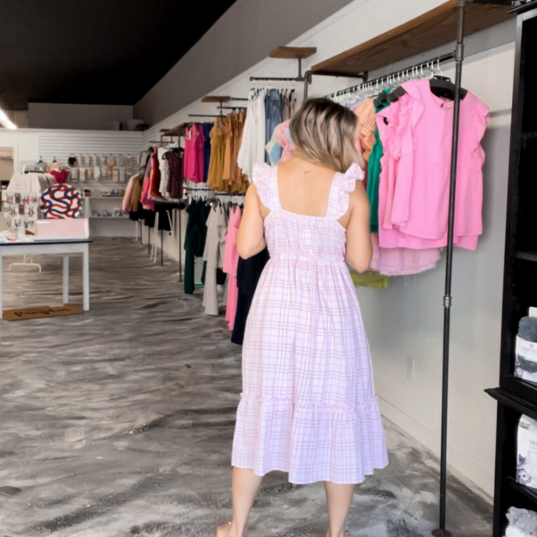 soft light pink plaid printed midi dress with ruffle cap sleeves.