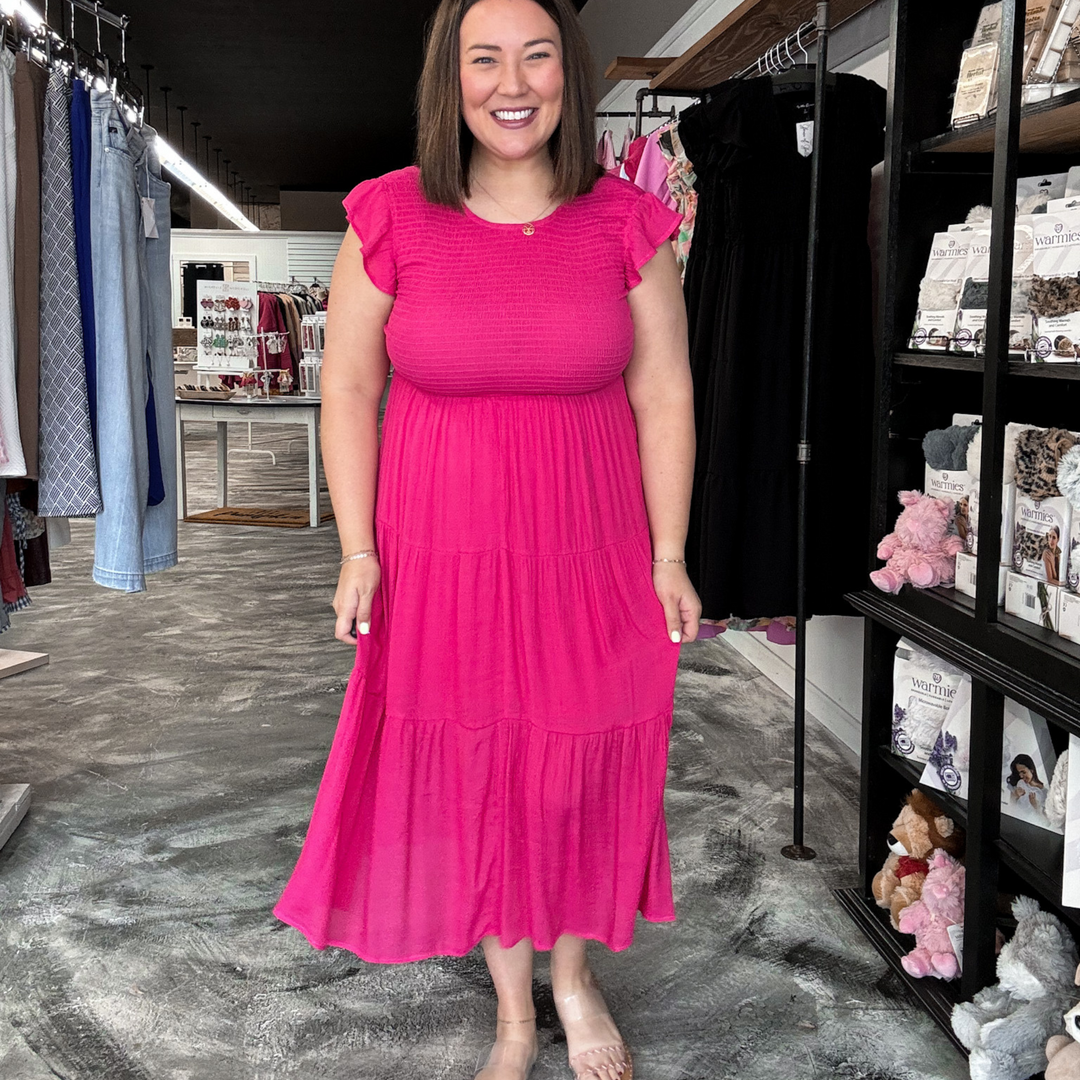 pink smocked midi dress with ruffle sleeve detail