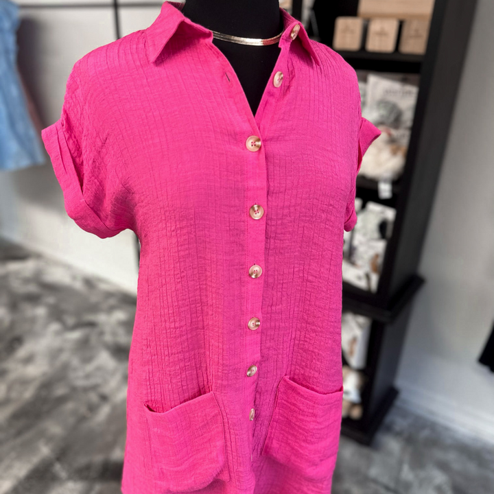 pink tunic dress, light weight, button down closure, two pockets at hip area