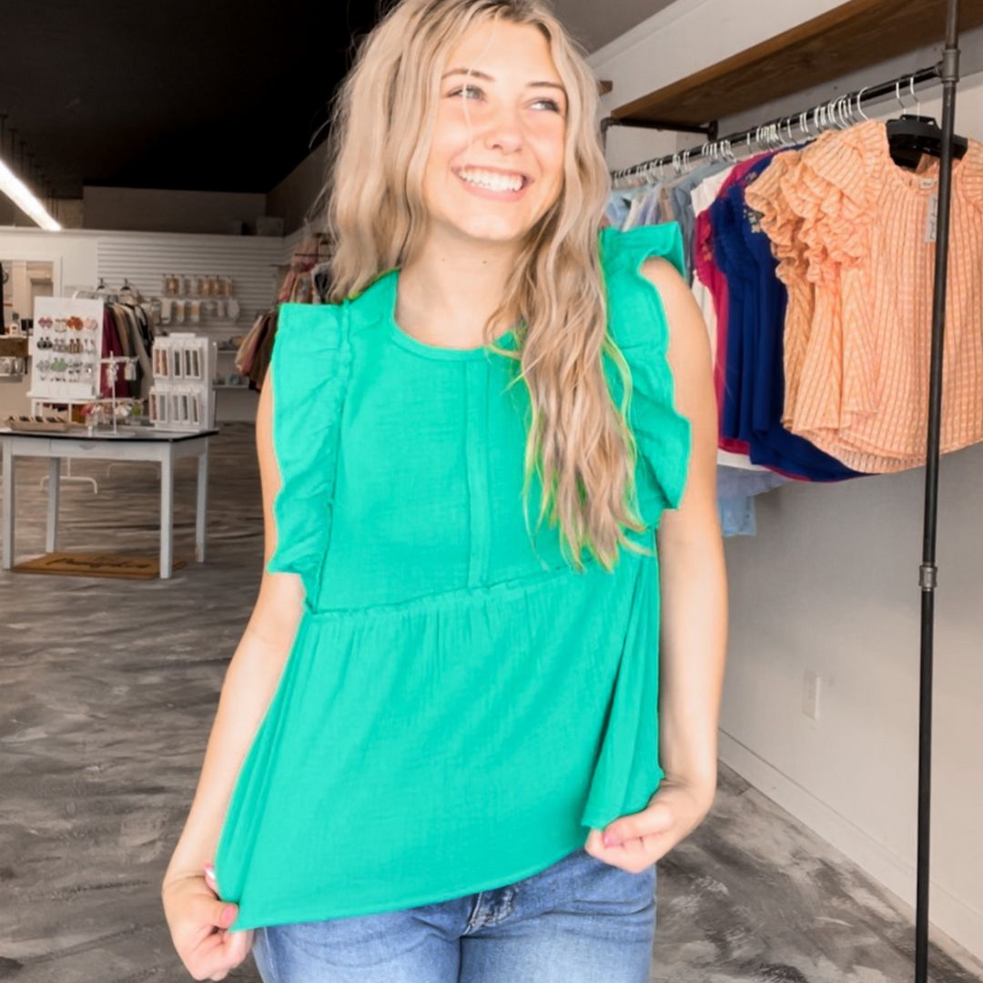 Simply sweet kelly green short sleeve top, ruffle detail on sleeves with baby doll type fit