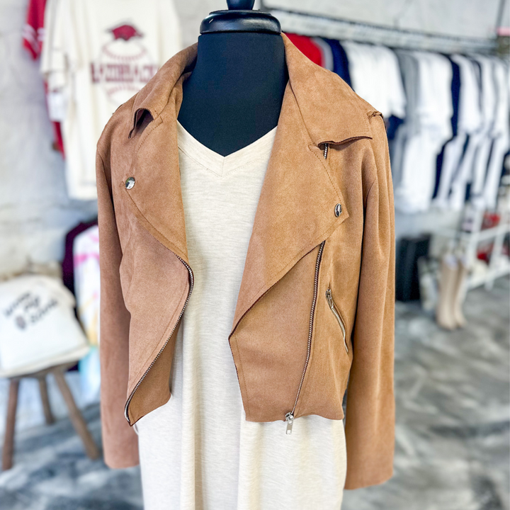 faux suede light brown, tan color jacket with metal buttons, functioning zipper and functioning pocket with zipper, great to put over a tight fitting shirt