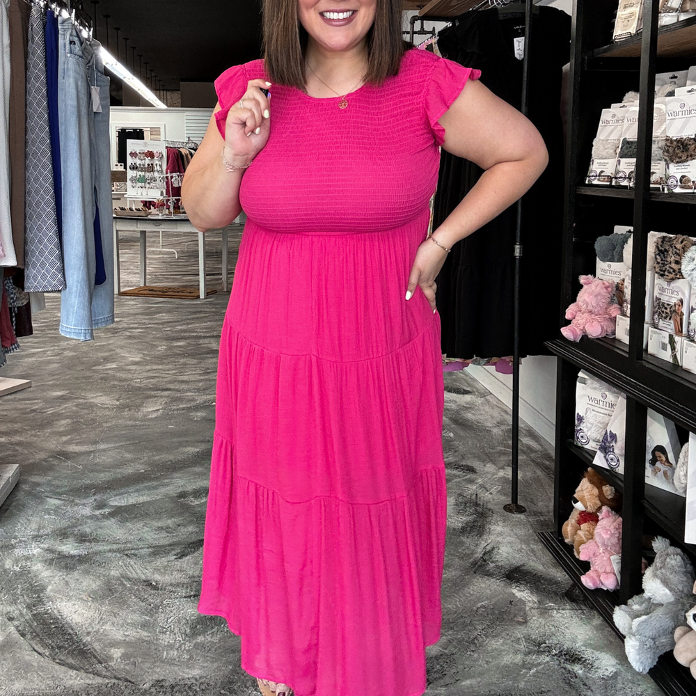 Sweet and charming short sleeve pink midi dress, with ruffle detail on sleeve