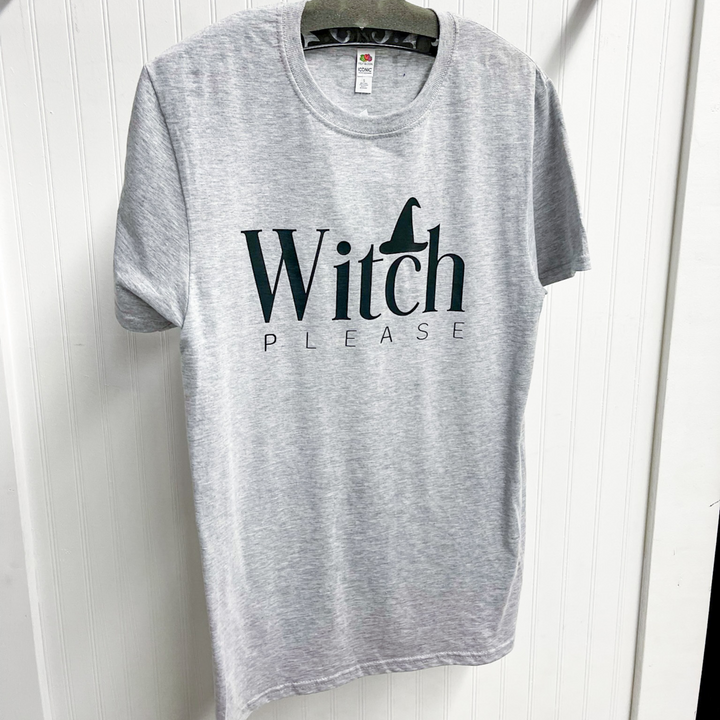 halloween graphic tee, grey round neck tee shirt with the words Witch Please in two different font, letters are black, witch hat above the letter c. 