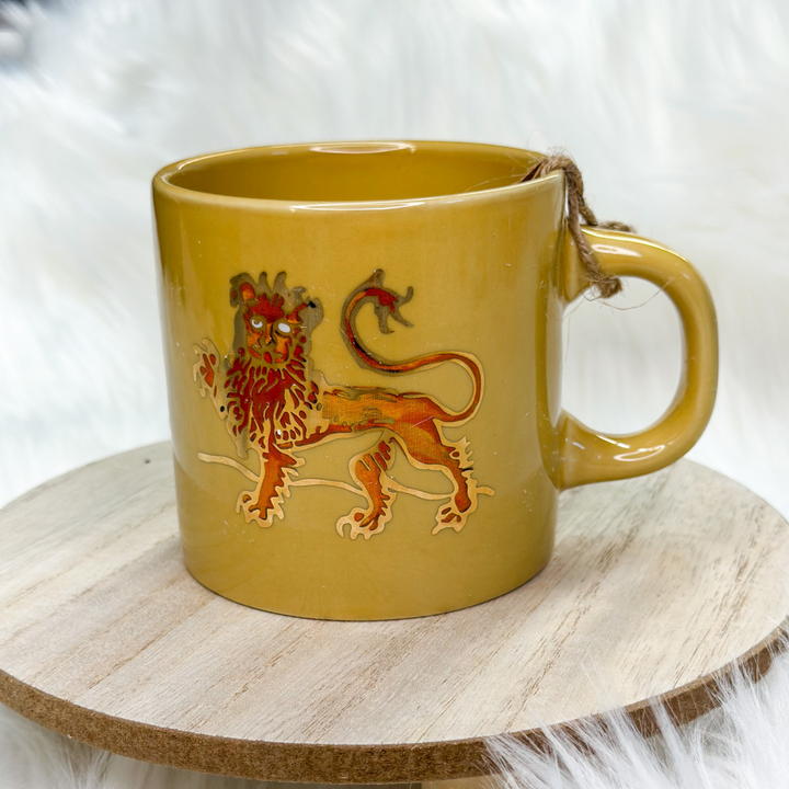 coffee cups, all 12 zodiac signs, different designs representing each zodiac sign, some animals, some vibrant colors on certain cups 